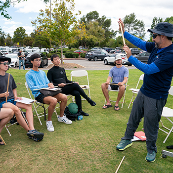 An instructor showing basics of wingfoiling