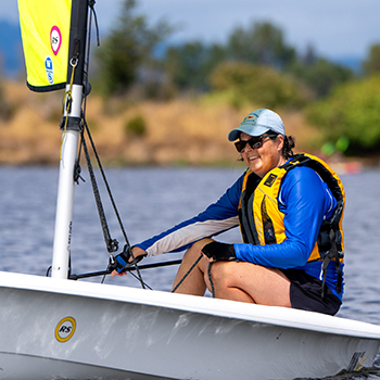 A woman in a sailboat